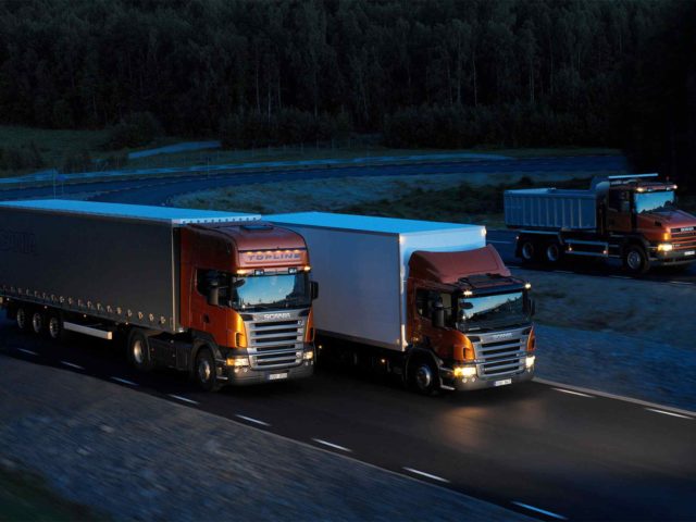 Three-orange-Scania-trucks-640x480.jpg